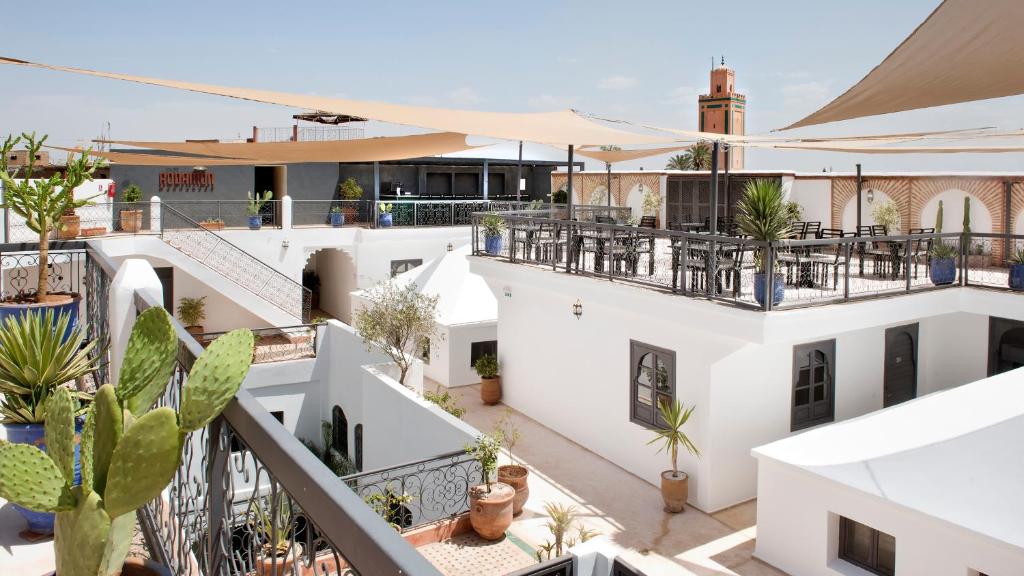 Rooftop terrace with Atlas Mountains view at a Marrakech riad